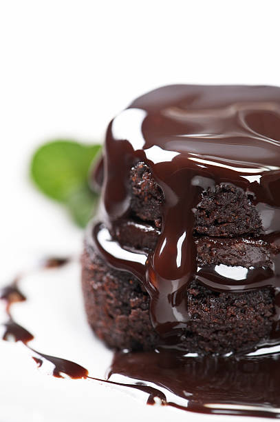 istock Delicious hot fudge on chocolate cake 183254434