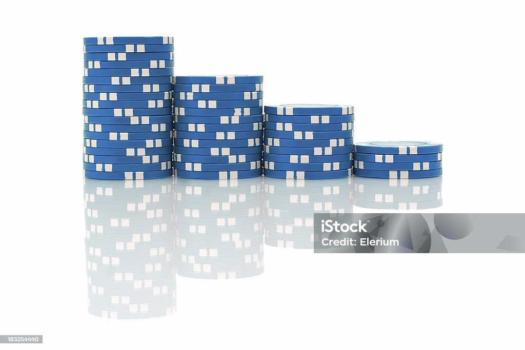 Blue Poker Chips Four stacks of blue poker chips on a pure white background with reflection. Blue Stock Photo