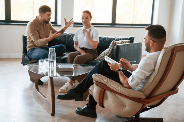 istock Screaming at each other. Couple at a psychologist's appointment 1832545665