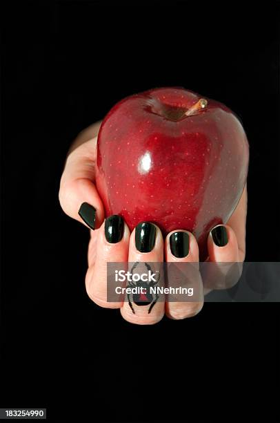 Poison Apple In Hand Stock Photo - Download Image Now - Apple - Fruit, Poisonous, Spider