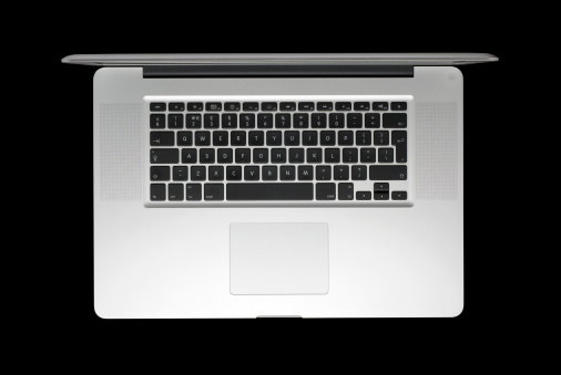 A silver laptop isolated on black with clipping path