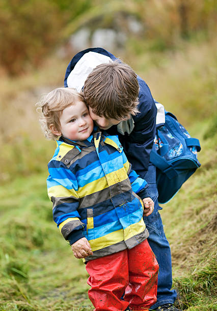 istock Elder brother with small boy outdoor 183255735