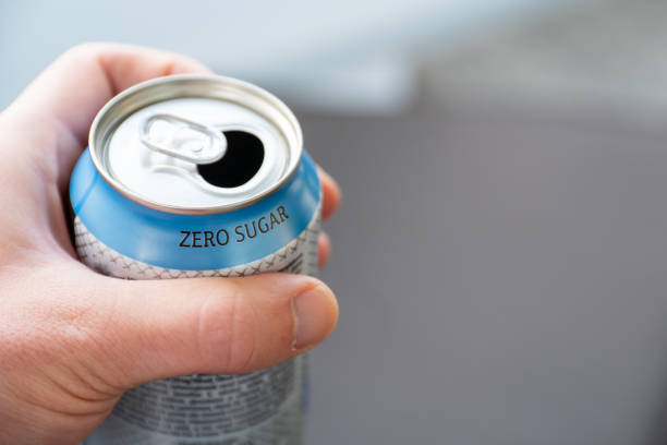 hand holding a zero sugar soda can. hand holding a zero sugar soda can. diet soda concept. coke zero photos stock pictures, royalty-free photos & images