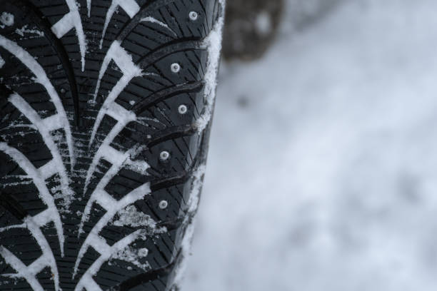 istock close up of snowy winter tire 1832558794