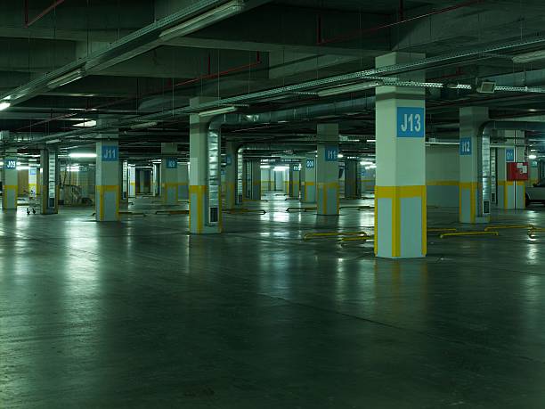 istock Parking garage, underground interior without cars 183255918