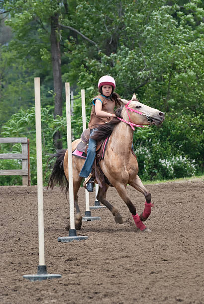 istock Determined Girl Riding Horse in Competition 183256316