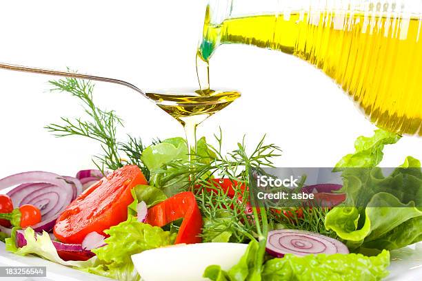 Golden Olive Oil And Vegetable Salad Stock Photo - Download Image Now - Appetizer, Bowl, Cooking Oil