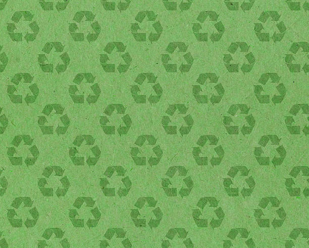 recycle symbol on green paper Please view more recycled backgrounds here: recycle symbol cut out stock pictures, royalty-free photos & images