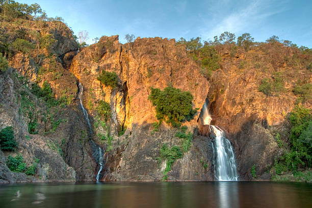 Wangi Falls Breathtaking Wangi Falls at sunset in Litchfield National Park near Darwin in the Northern Territory. darwin nt stock pictures, royalty-free photos & images