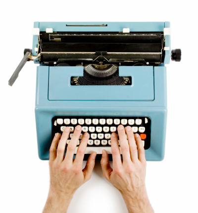 Male hands typing on classic typewriter.Similar shots: