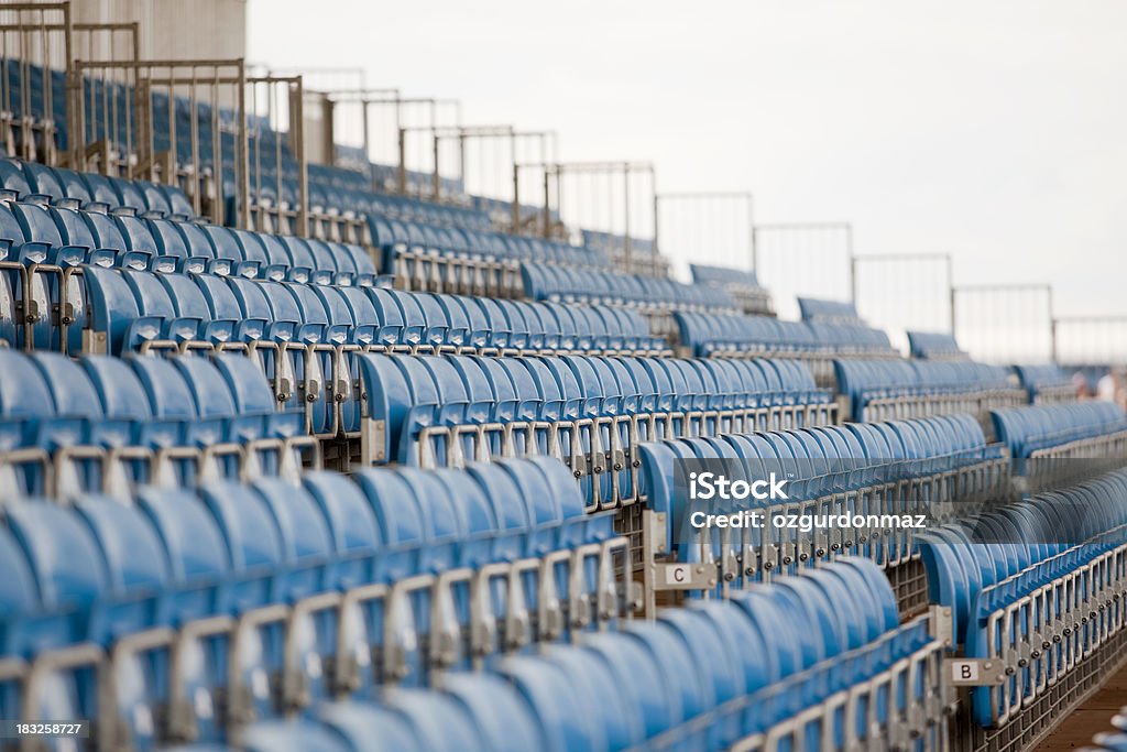 Stadium seats "Row of blue seats in empty stadium. Silverstone, England" Silverstone Stock Photo