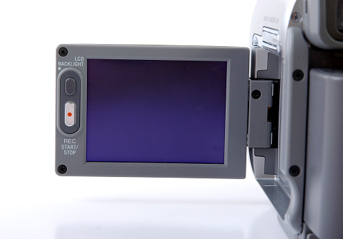 LCD screen of a digital video camera on white.