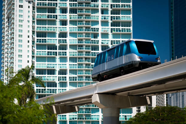 Commuter Light Rail Train Tram and HIgh Rise Condominium Tower