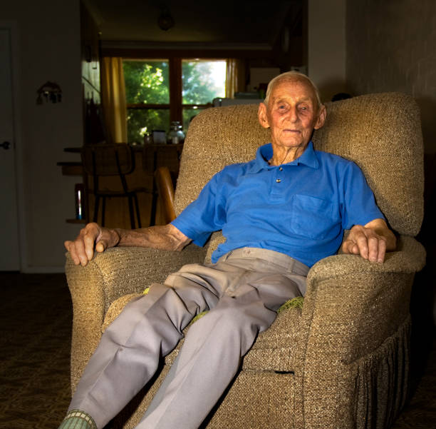 istock Elderly Man sitting in his arm chair 183259633