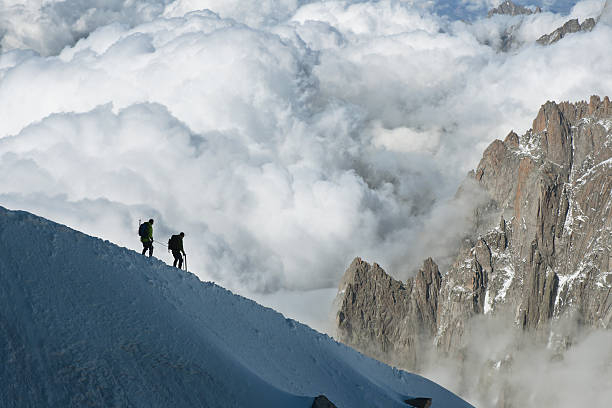 istock Mountain Hikers Above the Clouds 183259674