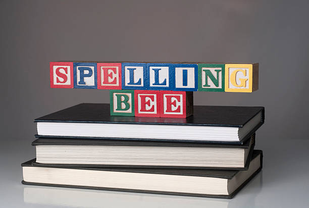 Spelling Bee Stock photo of children's blocks spelling out spelling bee spelling bee stock pictures, royalty-free photos & images