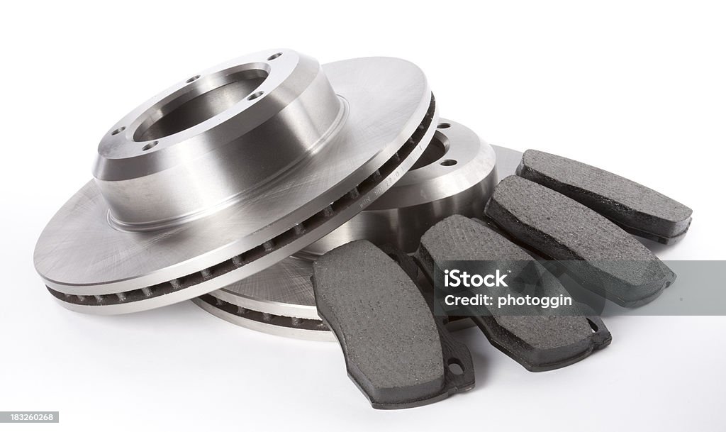Full Set Brake Discs and Pads Studio shot of a full set of front brake discs and pads on a white background.View Full Category: Brake Pad Stock Photo