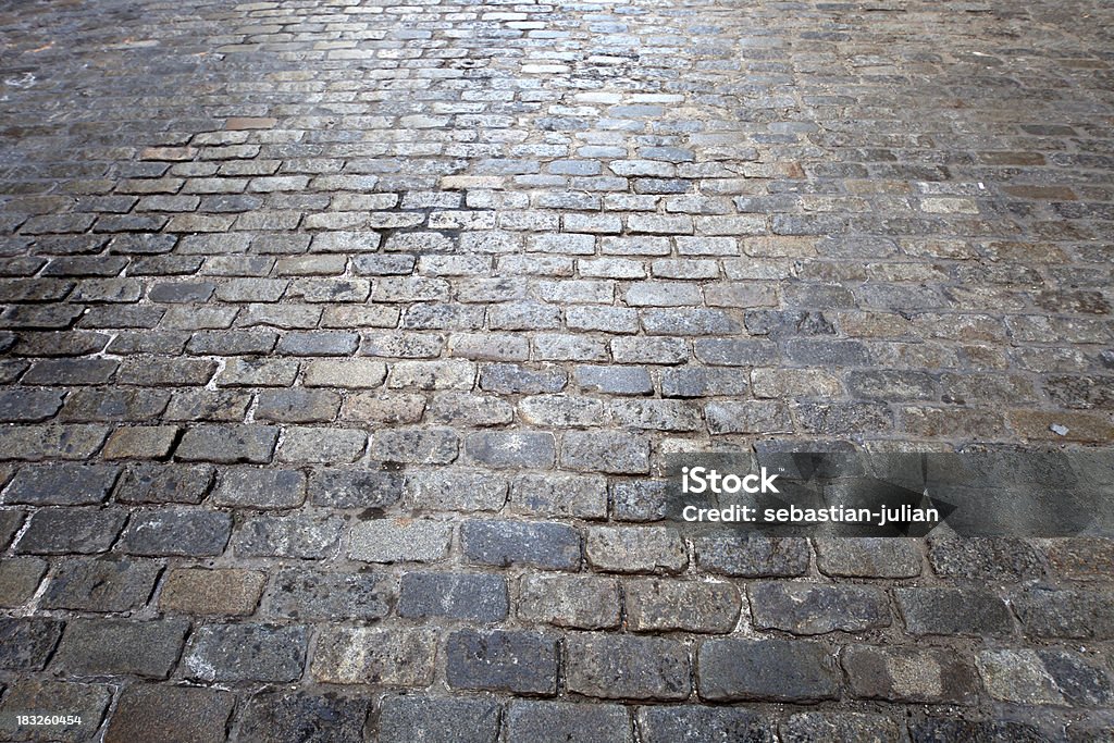 Strada di ciottoli pietre verde Strada di manhattan, new york city - Foto stock royalty-free di A forma di blocco