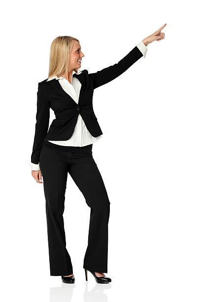 istock Pretty woman in business suit disco pointing 183260719