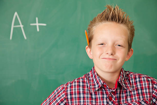 istock Young Boy at School Proud of His Successful Grade 183261180