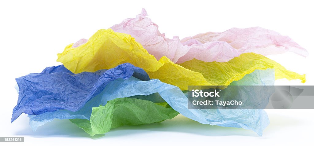 Multi colored tissue paper pile "Green, light blue, dark blue, pink and yellow crumpled tissue paper stack on a white background." Tissue Paper Stock Photo