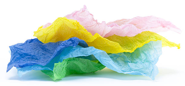 Multi colored tissue paper pile stock photo