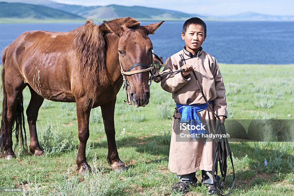 Jeune Randonneur à cheval mongol - Photo de Savoir-faire libre de droits