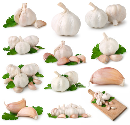 Garlic cloves collection on white. This file includes