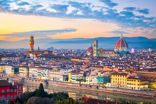 Florence, Italy historic town skyline at dusk.