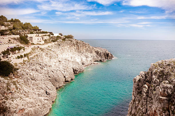 The Ciolo Inlet, Gagliano Del Capo - Lecce (Apulia, Italy) The Ciolo is a deep canyon carved out over millennia by meteoric waters. The name comes from the magpies, which lived in the area until a few years ago. lecce stock pictures, royalty-free photos & images