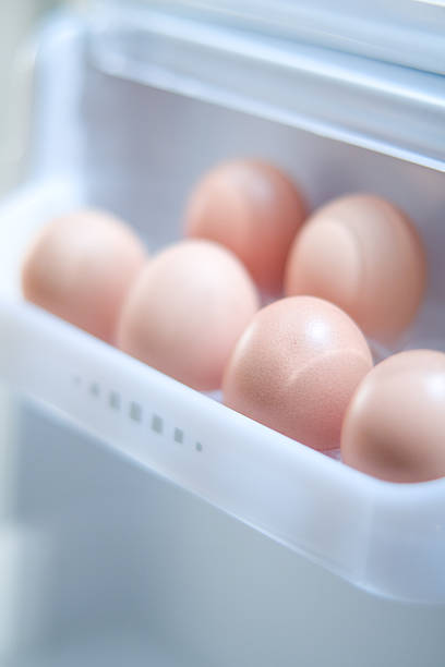 Eggs in the fridge stock photo