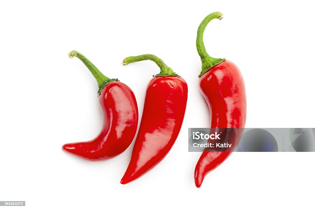 Hot Chili Peppers Hot Chili Peppers on white background Chili Pepper Stock Photo
