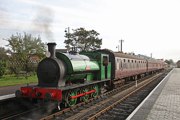 istock Old fashioned steam train at Sheringham, Norfolk, England 183263562