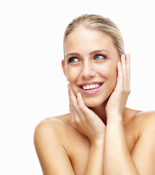 istock Attractive young woman smiling against white background 183263574