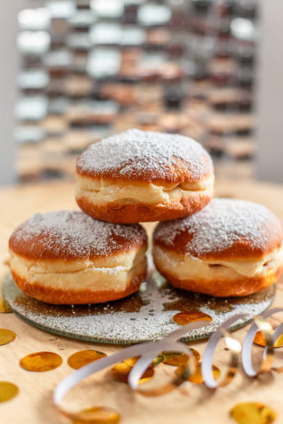 istock Fresh doughnut pastry beignet with icing sugar and confetti for celebration party 1832638753