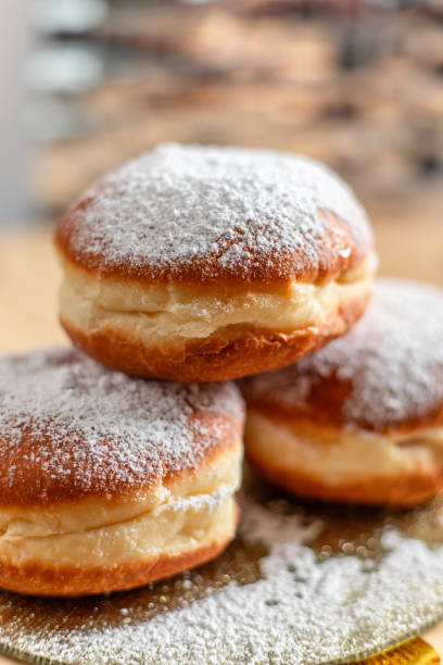 Fresh doughnut pastry beignet with icing sugar and confetti for celebration party Fresh doughnut pastry beignet with icing sugar and confetti for celebration party beignet stock pictures, royalty-free photos & images