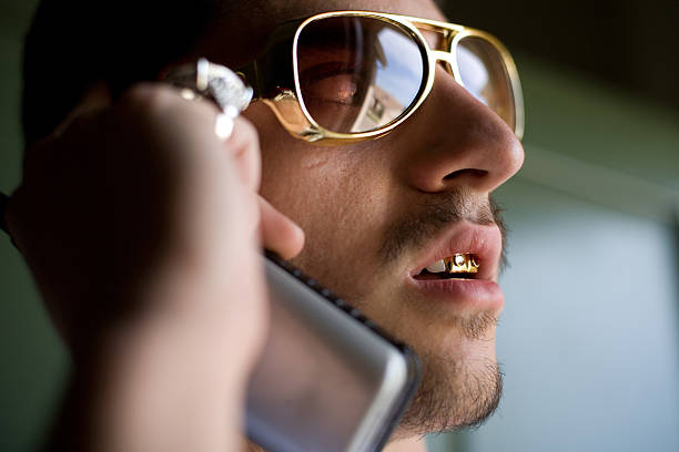 Top view of mobile phone, bag and sunglasses and on wood background. in Madrid, Community of Madrid, Spain