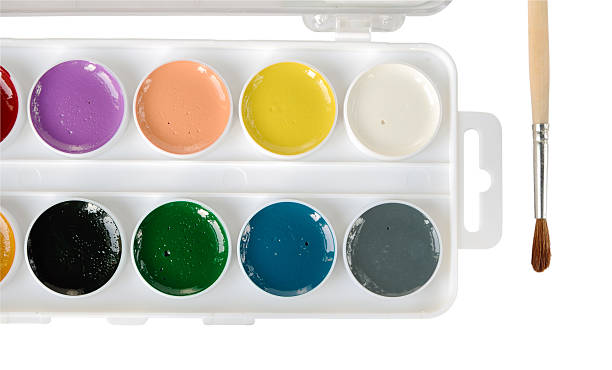 istock Watercolor paints and paintbrush close up 183264692