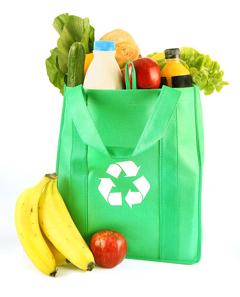 eco 再利用可能なショッピングバッグ - shopping bag orange bag handle ストックフォトと画像