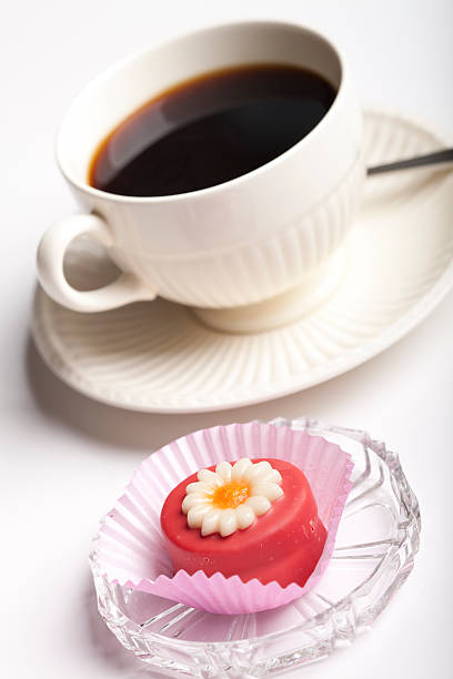 Cup of coffee with a petit four