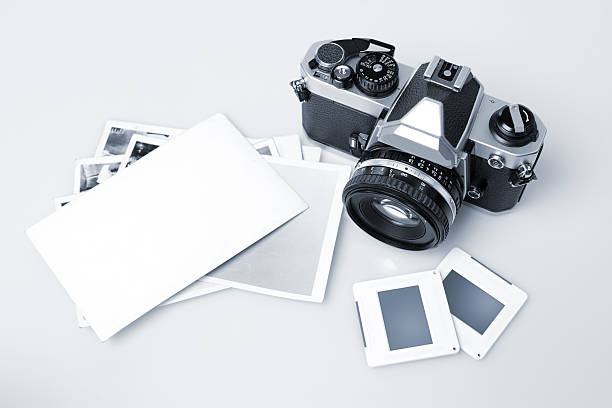 istock Retro Camera & Blank Photopaper 183265118