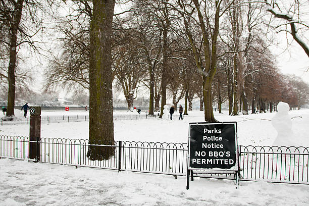Amusing Park signage Amusing park sign during winter snwo in London.  Image taken in Wandsworth park in Putney putney photos stock pictures, royalty-free photos & images