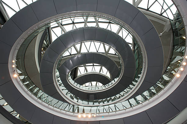 istock Spiral walkway in modern office building 183265515