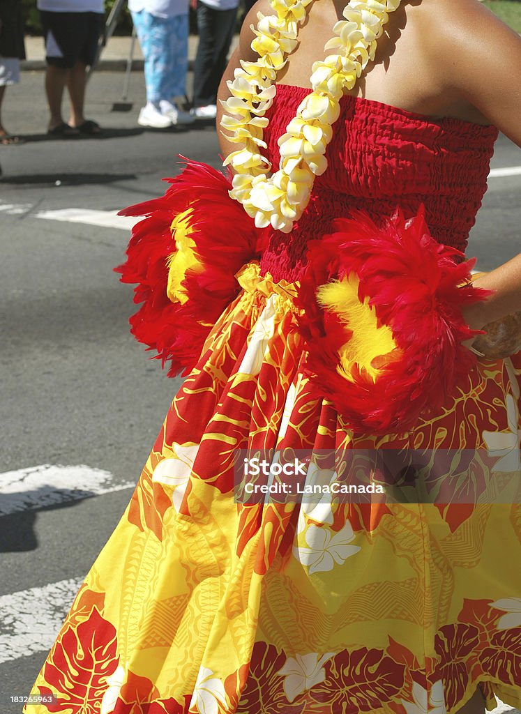 Hawaiian Hula Dancer Hawaiian Hula Dancer at Aloha Festival in Honolulu. Vibrant colored feather gourds used in Hawaiian hula add excitement to the dance. Parade Stock Photo