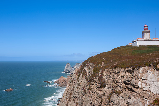 The lighthouse on Cabo da Roca (Cape Roca) the westernmost extent of mainland Portugal and continental Europe in the municipality of Sintra near Cascais and Lisbon.