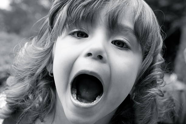 istock Little Girl with Mouth Wide Open 183266625