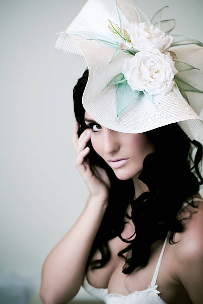 istock Young Woman wearing flower hat 183267386