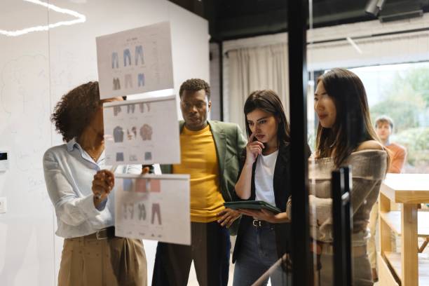 istock People brainstorming during a business meeting in the modern office 1832681646