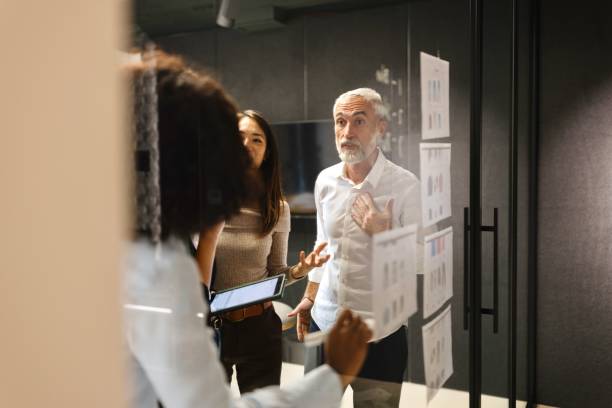 istock Man discussing about a new project during a business meeting 1832681652
