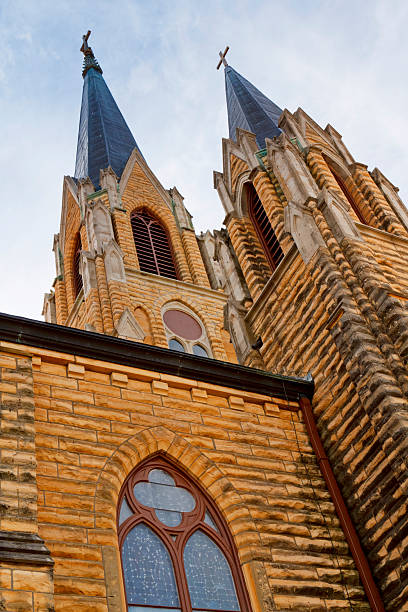 istock Beautiful Gothic Style Church Steeples Rise High into Blue Sky 183268472